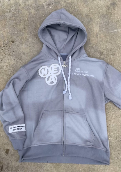 “Evil Is The Root To All Problems” acid wash zip-ups