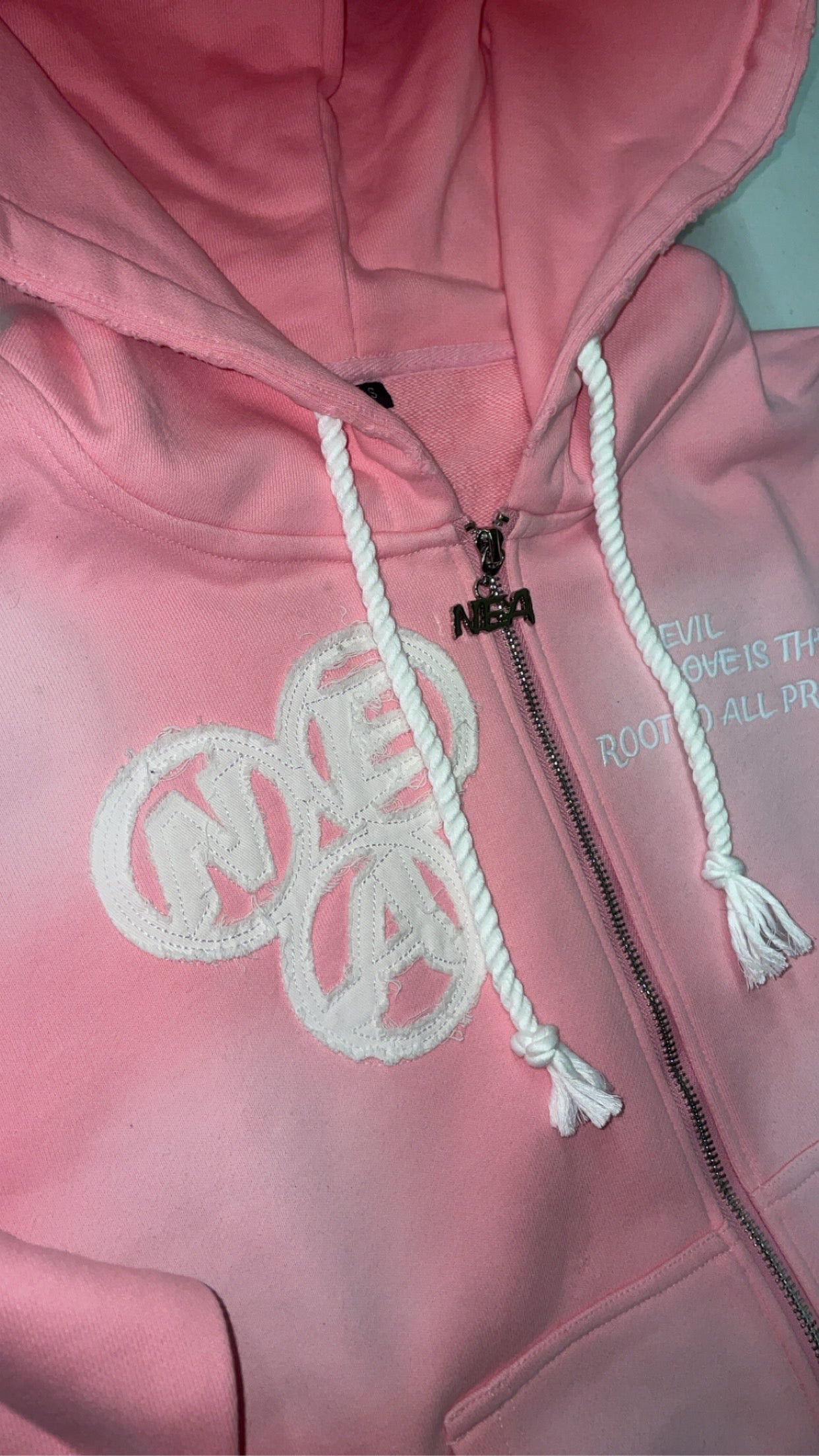 “Evil Is The Root To All Problems” acid wash zip-ups