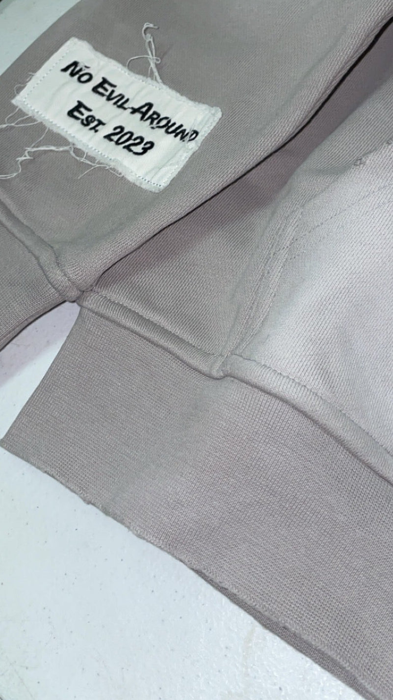 “Evil Is The Root To All Problems” acid wash zip-ups