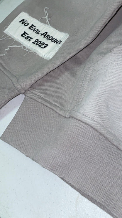 “Evil Is The Root To All Problems” acid wash zip-ups