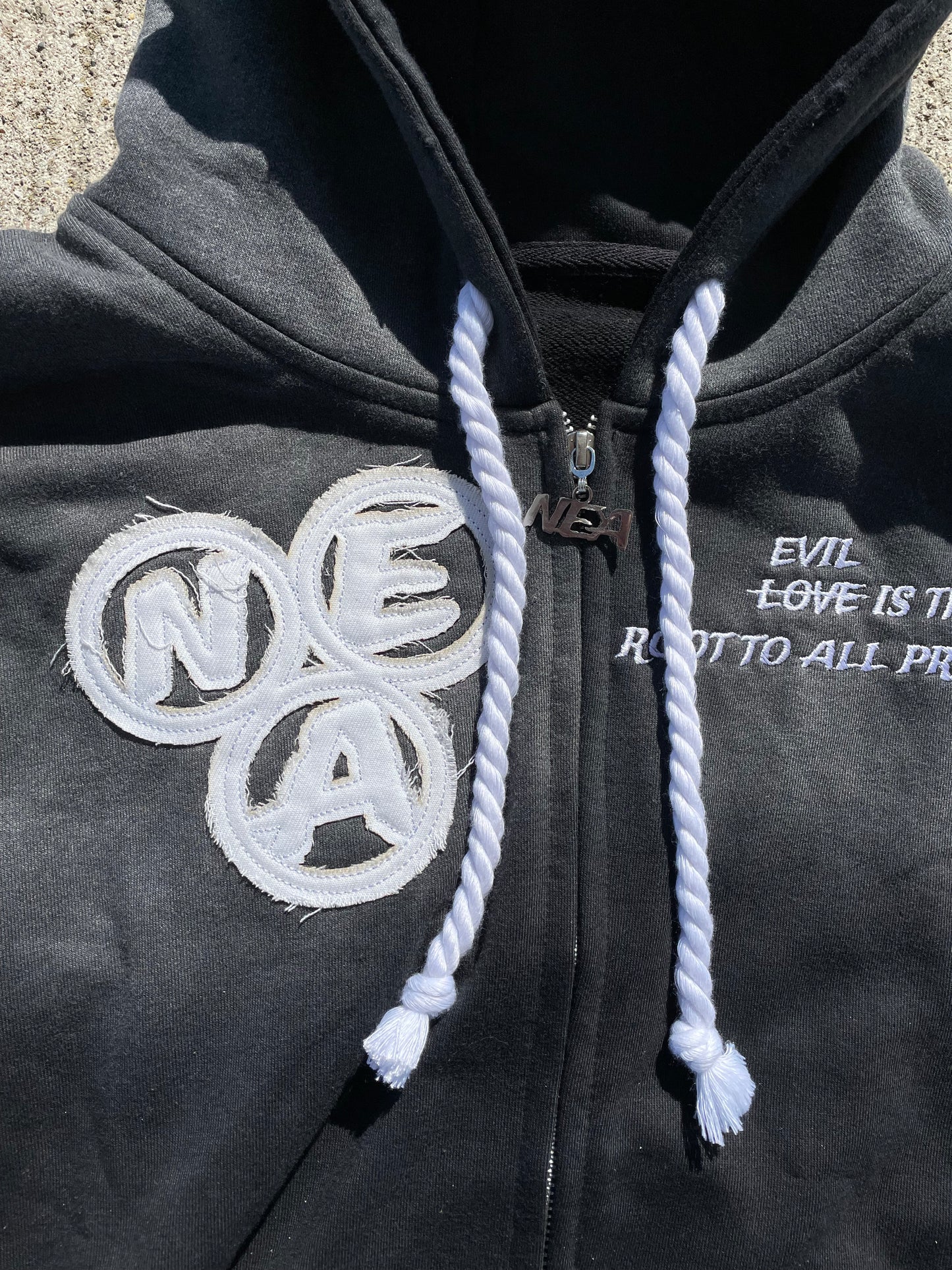 “Evil Is The Root To All Problems” acid wash zip-ups