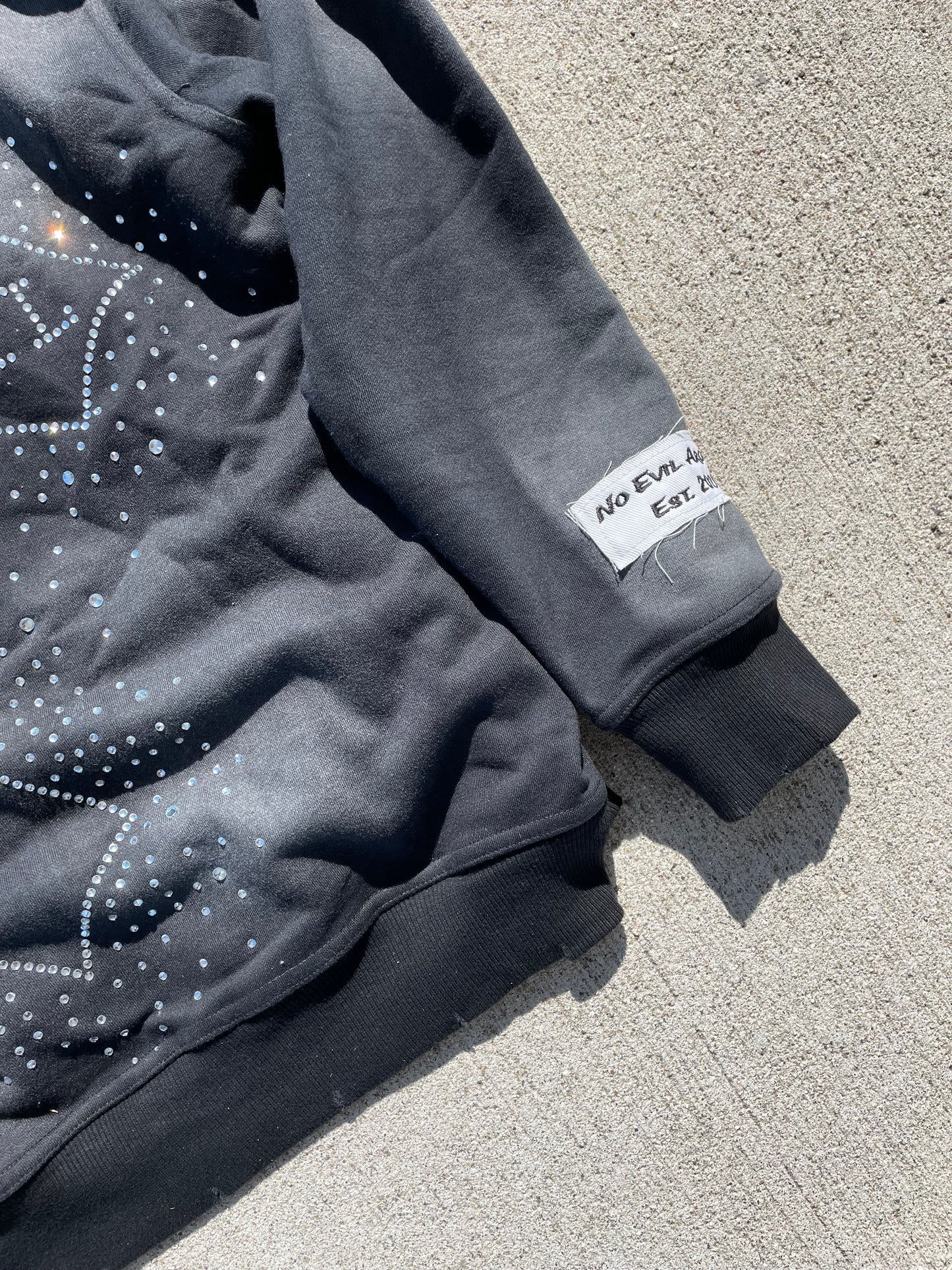 “Evil Is The Root To All Problems” acid wash zip-ups