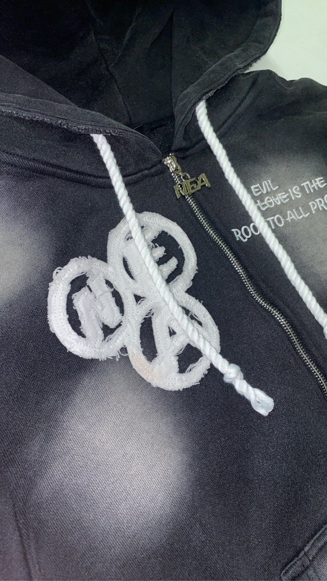 “Evil Is The Root To All Problems” acid wash zip-ups
