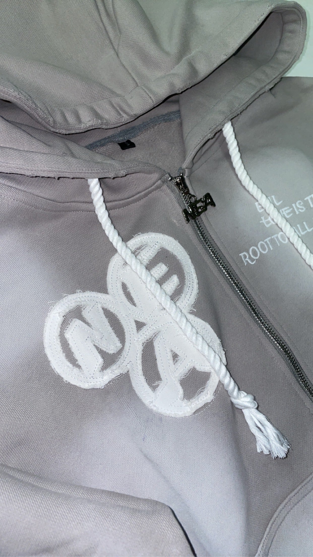 “Evil Is The Root To All Problems” acid wash zip-ups