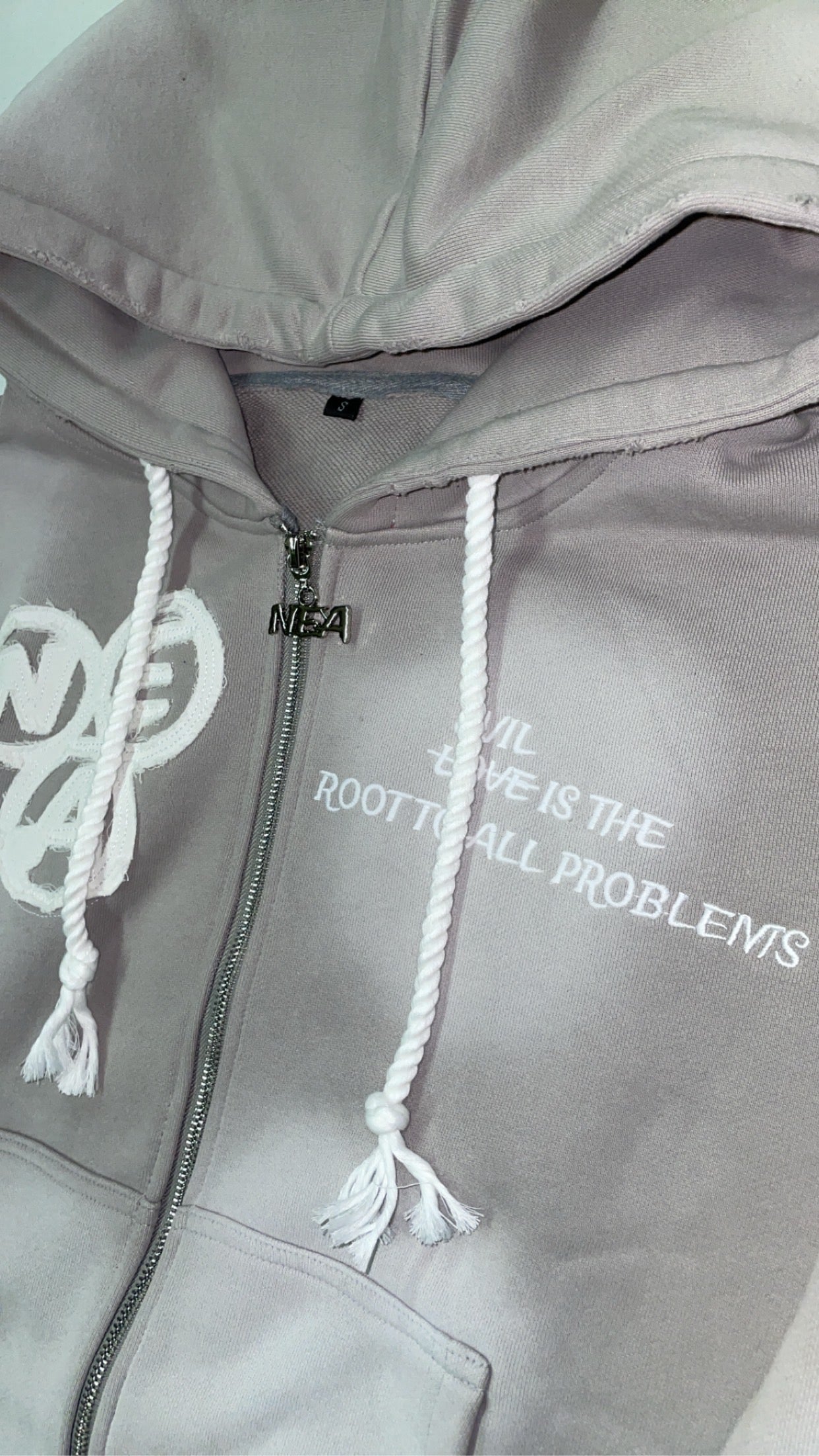 “Evil Is The Root To All Problems” acid wash zip-ups